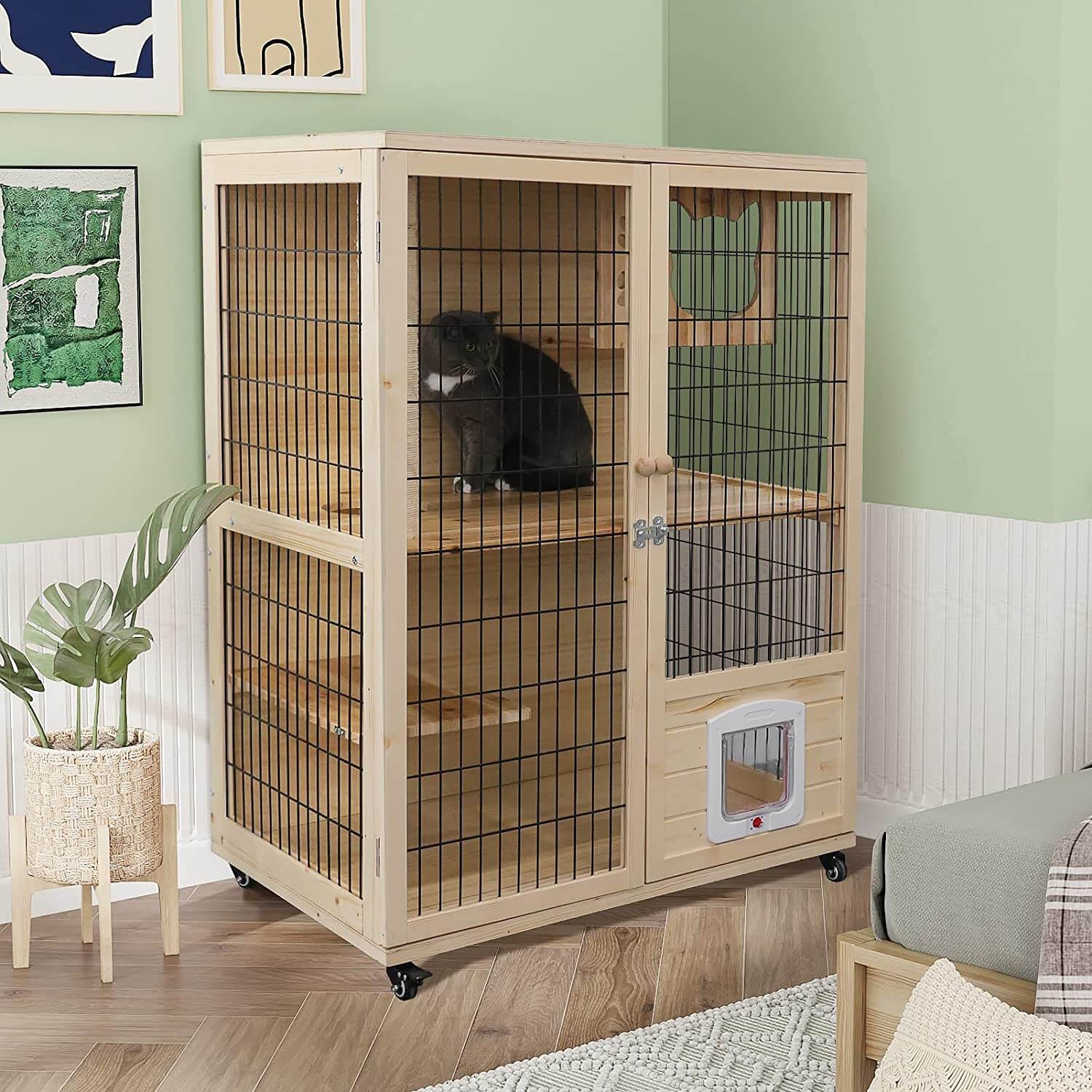 Cat sit in the Elecwish Wooden Large Cat House