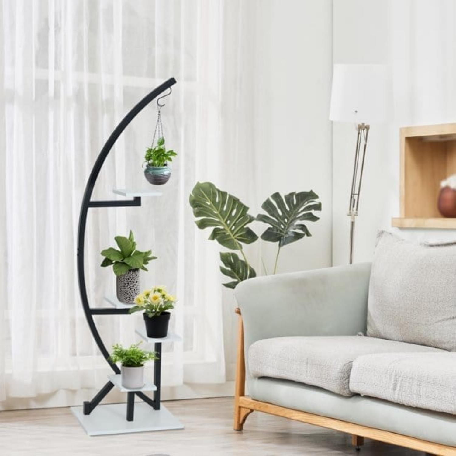 One of Black White Plant Stand Indoor 5 Tier Half Moon Plant Shelf displays